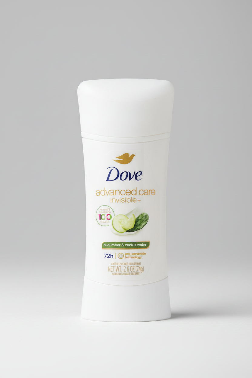 Dove advanced care invisible+ deodorant on a wooden surface with a blue background